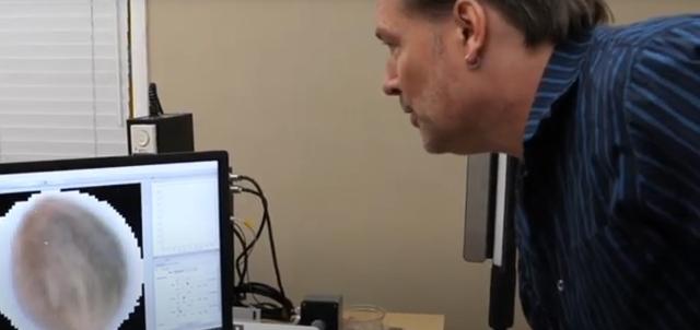 Figure 2: Christian Nansen reviewing hyperspectral data.